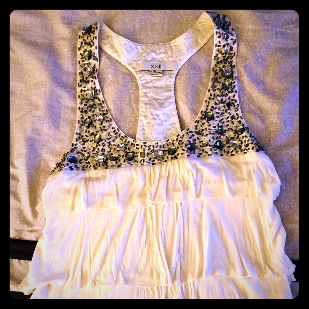 Blouse with decoration of Stones.